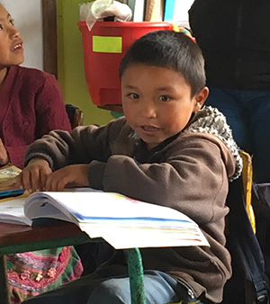 Image of boy in Guatemala classroom