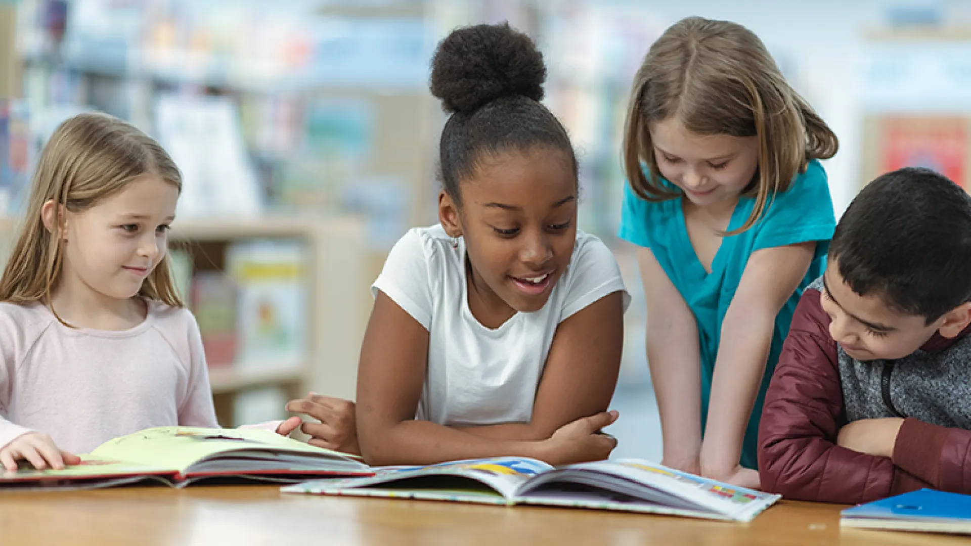 Kids reading together in school