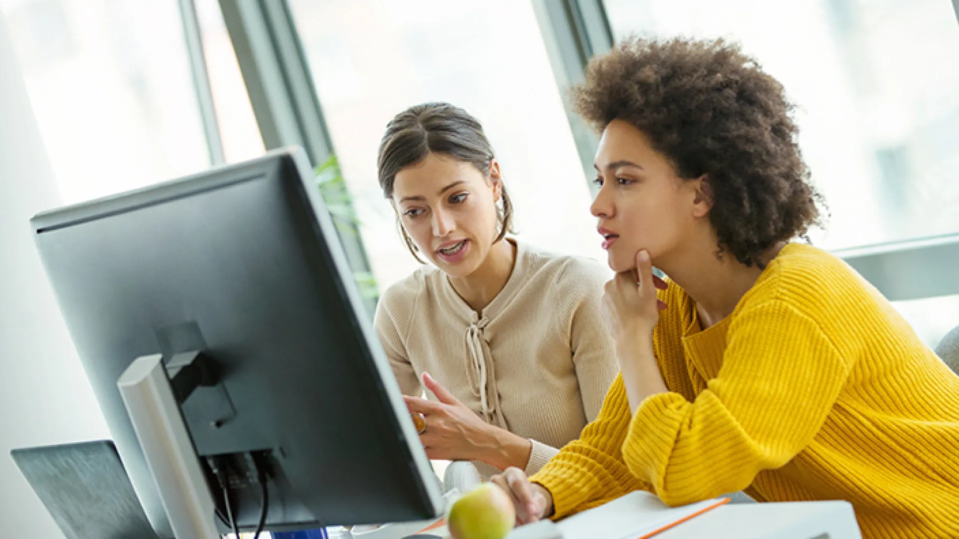 Female researchers collaborating