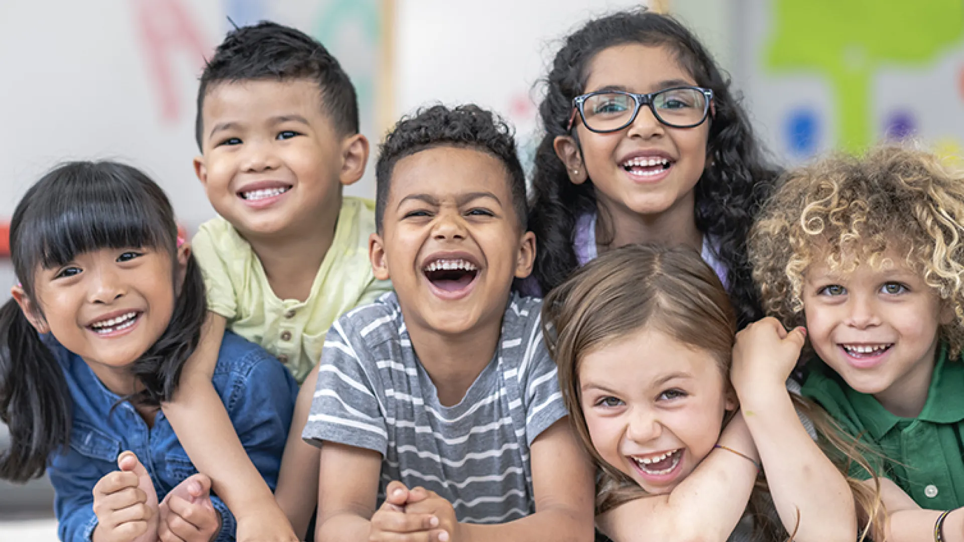 Group of young laughing children
