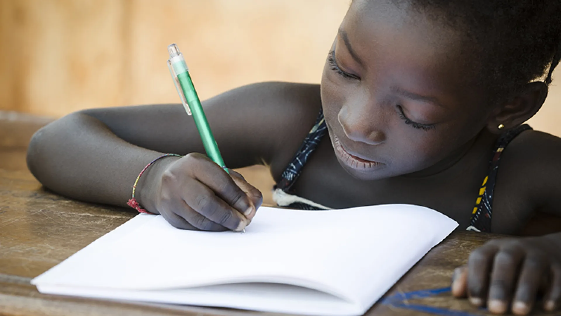 African girl studying in classroom