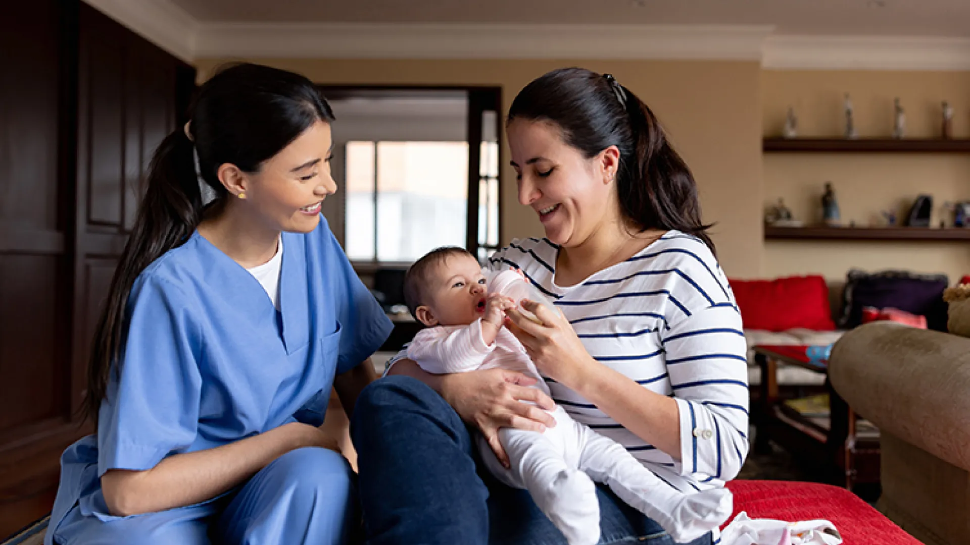 Home visit with mother and baby