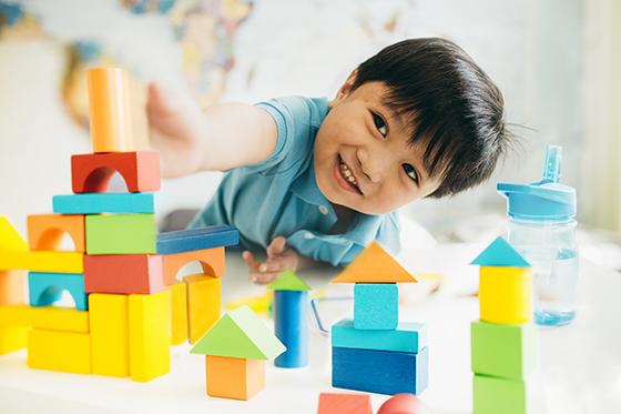 Preschooler playing with blocks