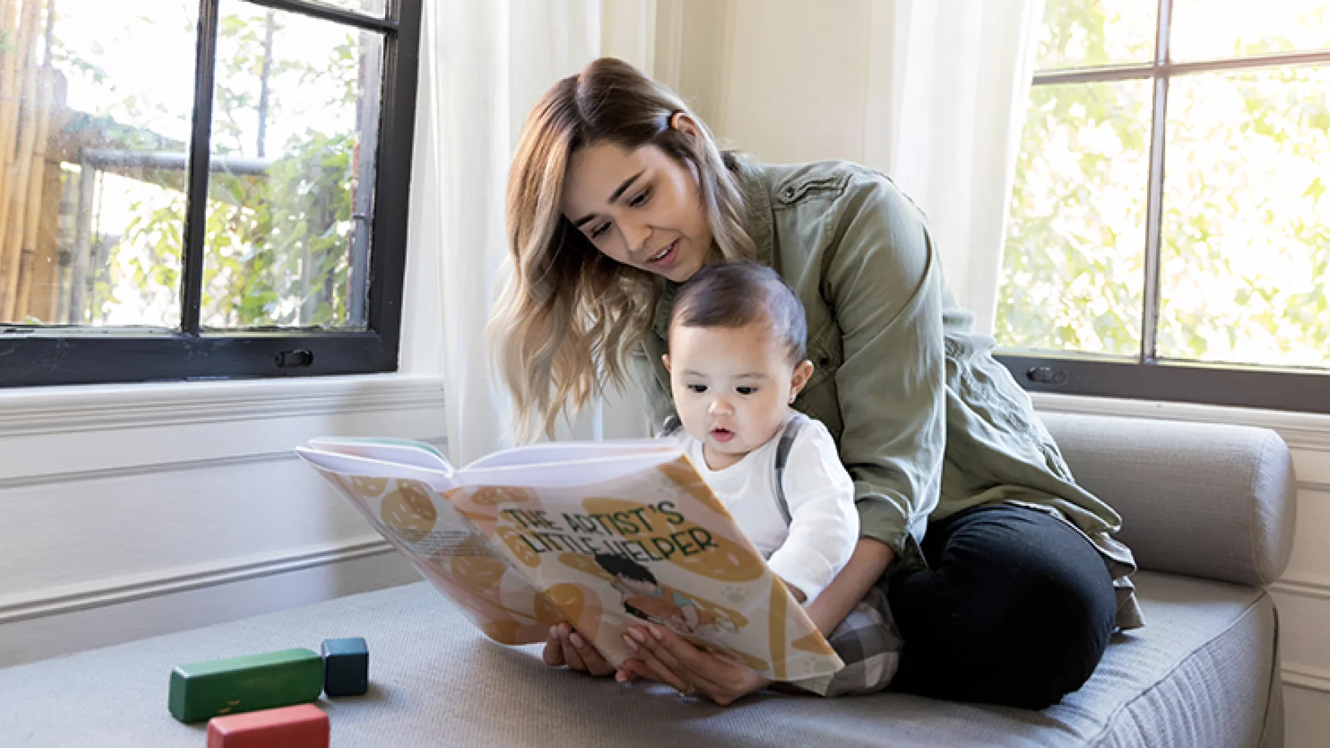 Mom reading to baby