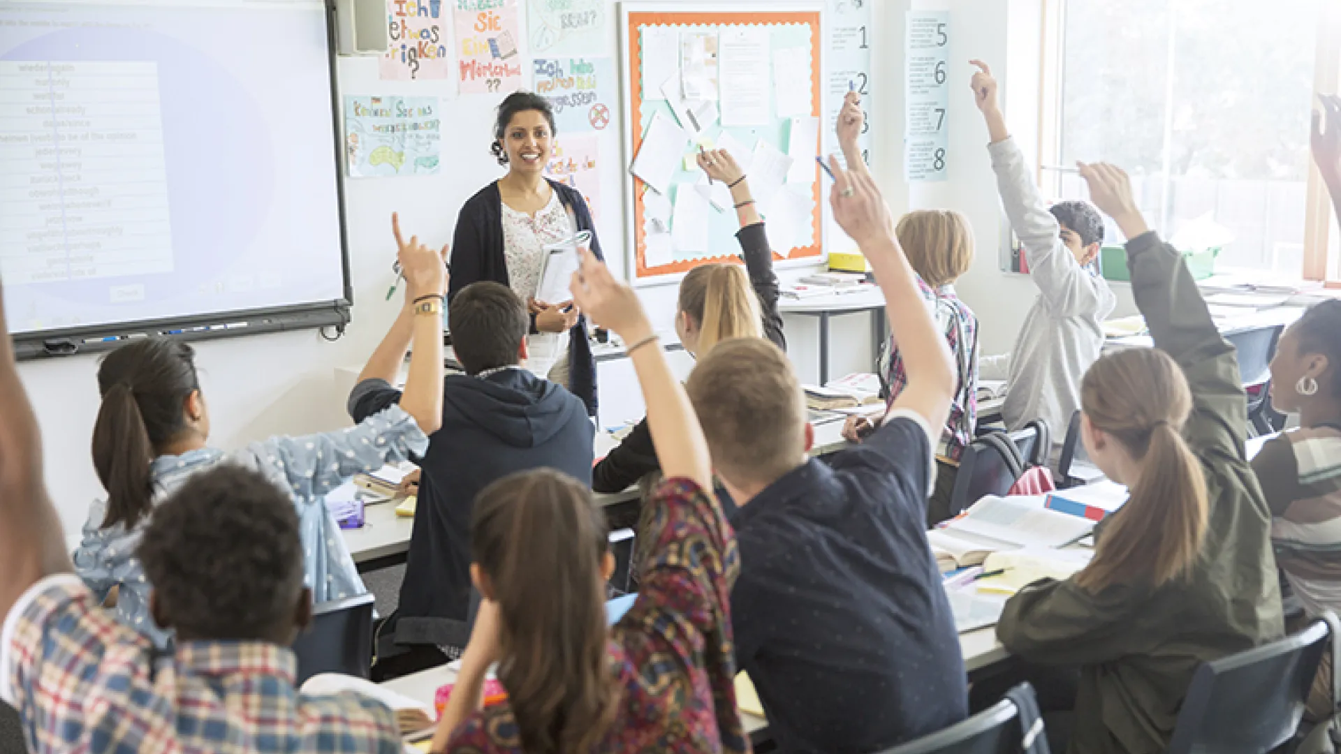 Teacher in high school classroom