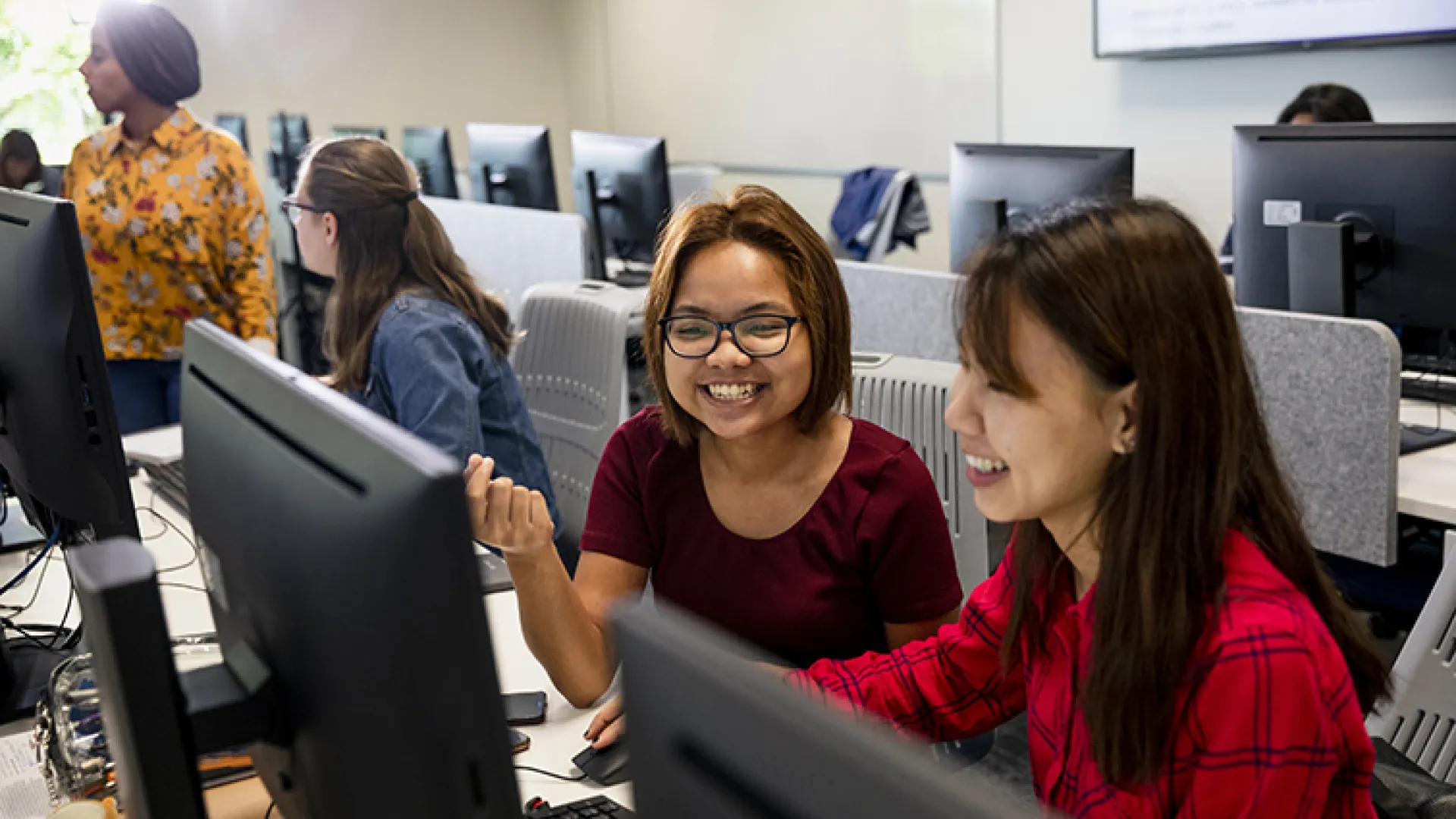 Young women in computer science class