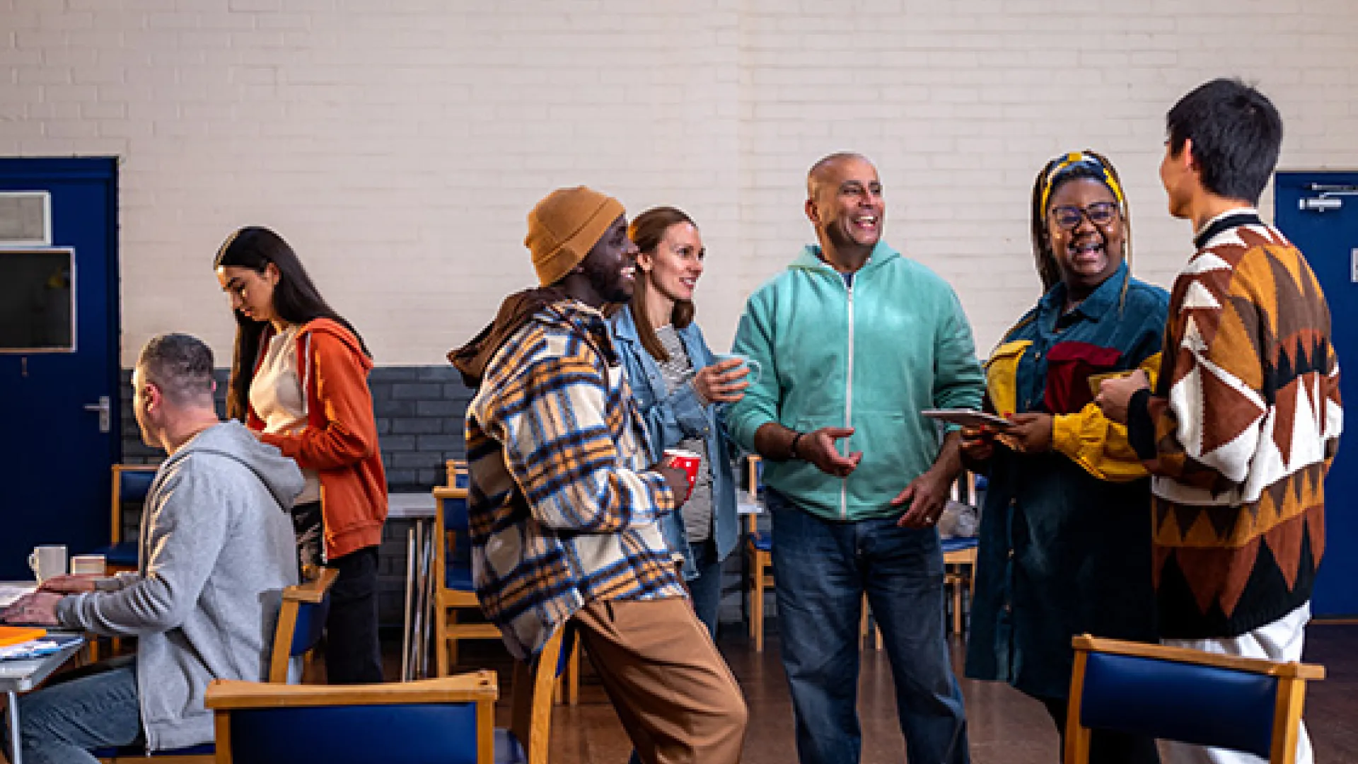 People laughing in a community center