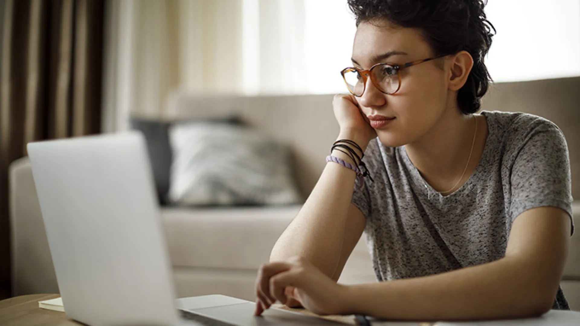 Young woman at her laptop