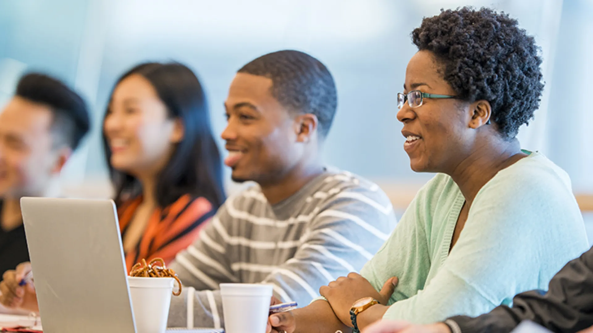 College students laughing in class