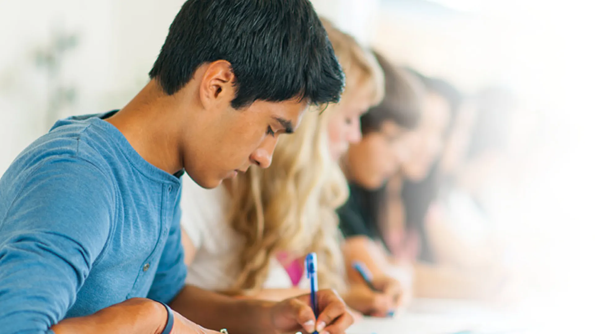 Teenagers doing schoolwork