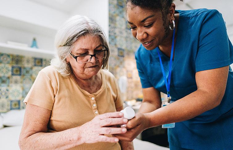 Healthcare worker with older patient