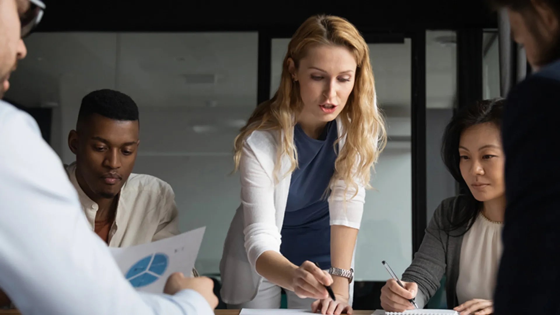 woman leading business meeting