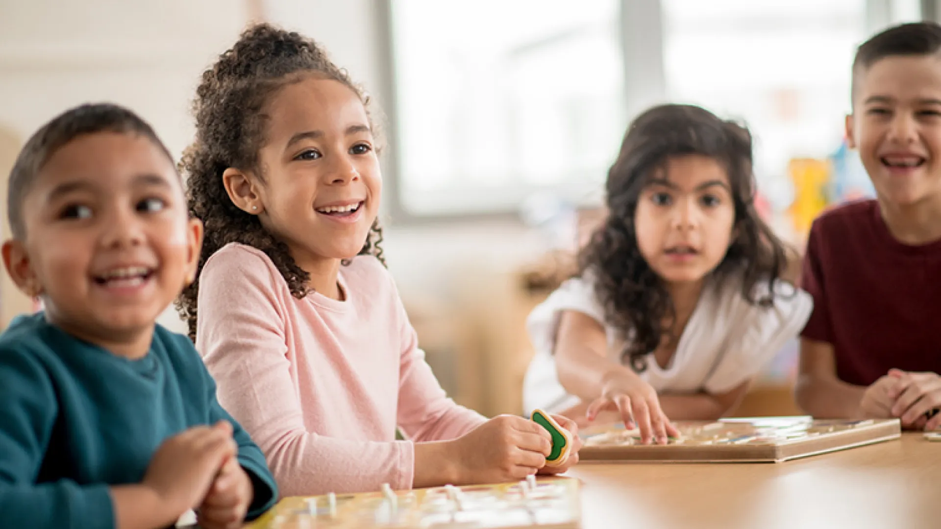 prek students working on a puzzle