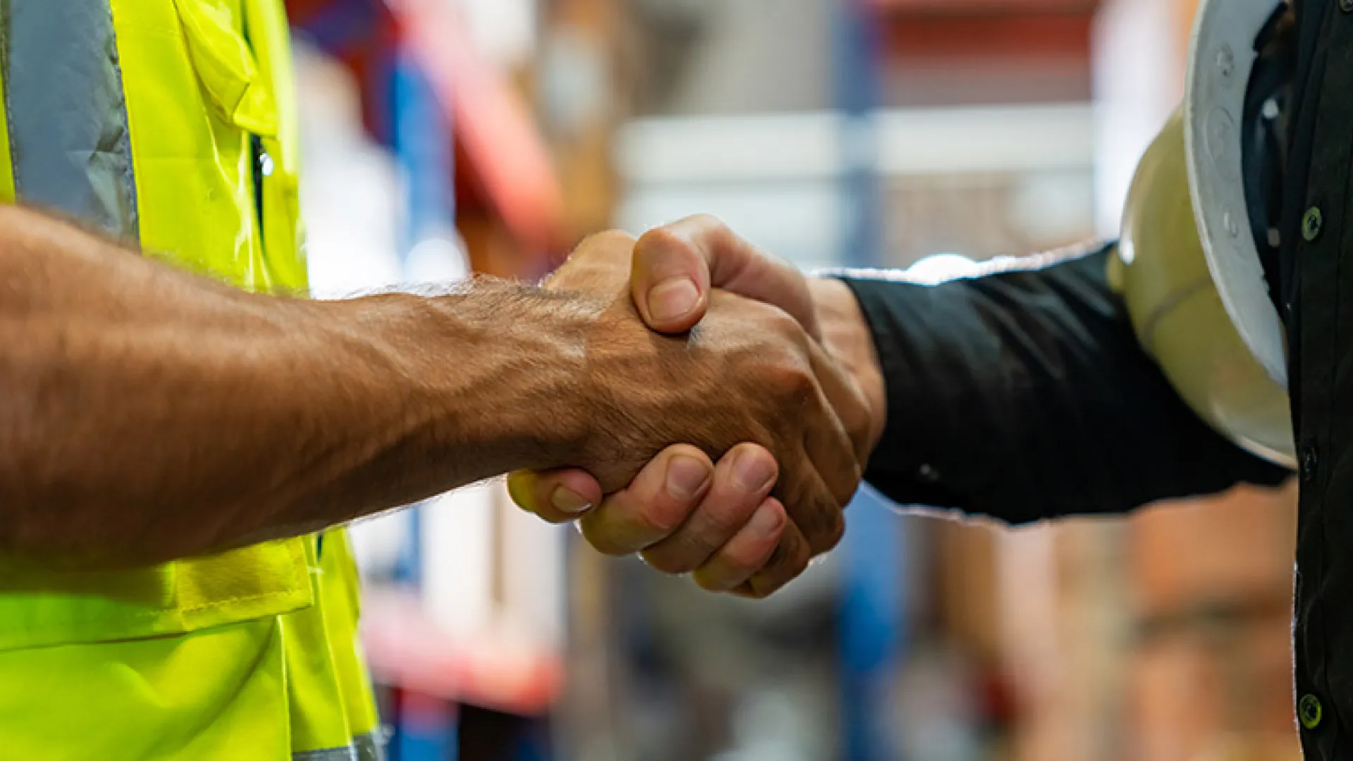 Union workers shake hands