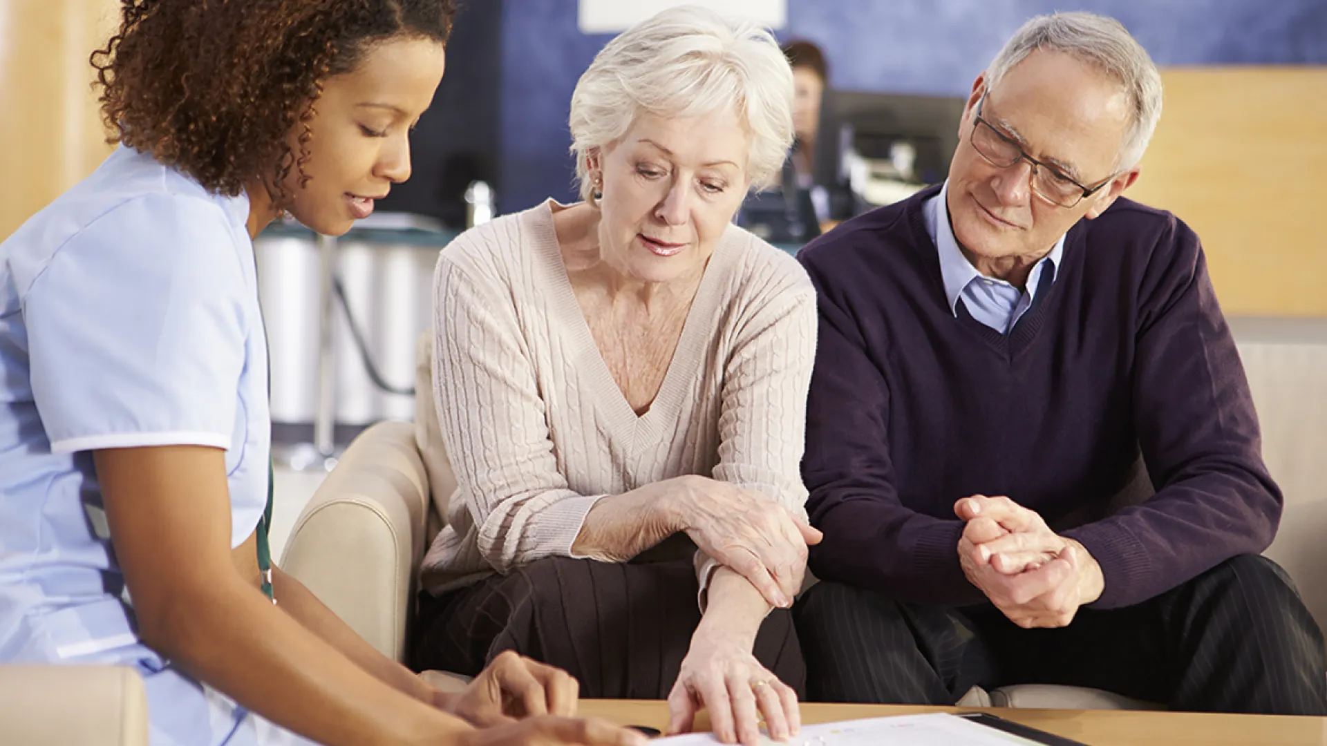 Health care practitioner with older couple