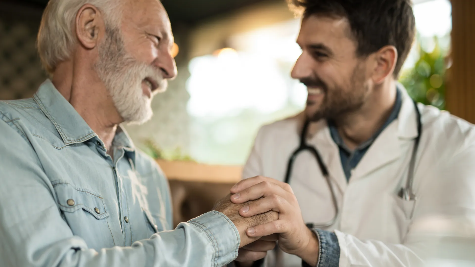 Rural doctor with older patient