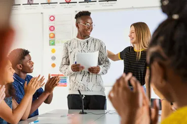 High school student presenting to class