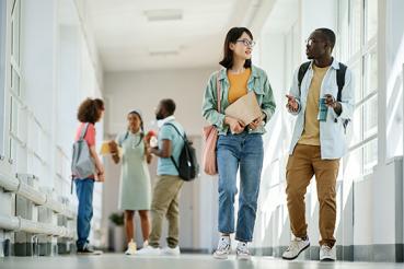 High school students talking in hallway