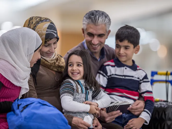 Smiling immigrant family