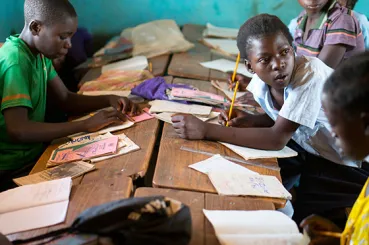 Boy in Zambian classroom