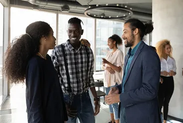 Young coworkers at an office gathering