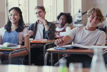 High school students laughing in class