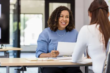 Employer interviewing job candidate