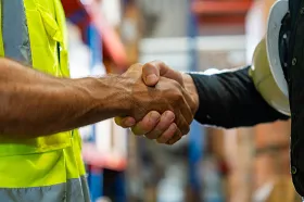 Mexican workers shaking hands