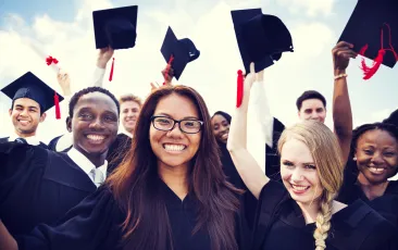 College graduates in caps and gowns