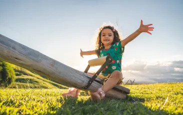 Girl on seesaw
