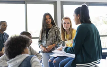 Image of students working together 