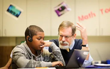 Image of Steve Leinwand and a middle school math student