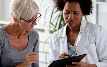 Doctor and older patient
