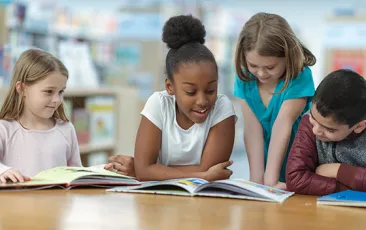 Kids reading together in school