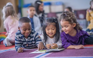 Three kids reading