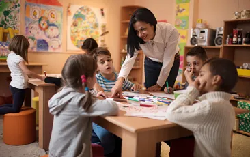 Teacher and kindergarten students