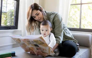 Mom reading to baby