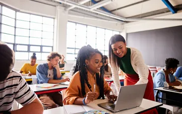 Computer science teacher with high school student