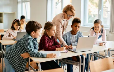 Teacher with elementary school students