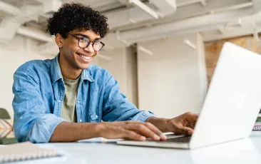 Young businessman at laptop
