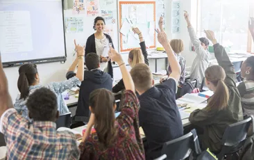 Teacher in high school classroom