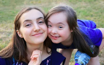 Afterschool worker and young girl