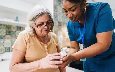Health care worker with older patient