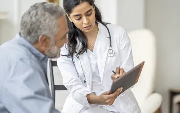 health care visit with senior man