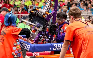 students in robotics competition
