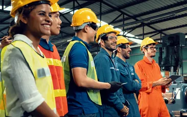 Smiling factory workers