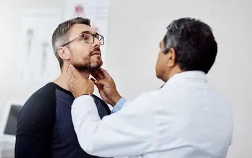 Doctor examining patient