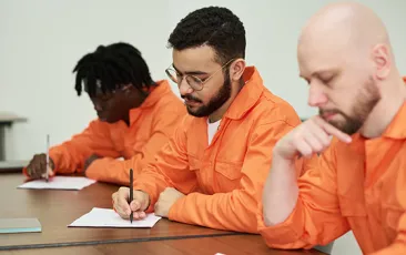 Prisoners in a classroom