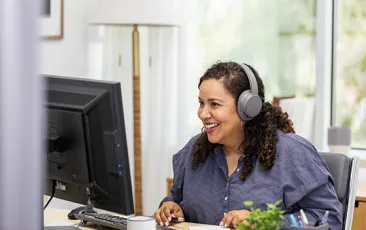 Adult learner using desktop computer