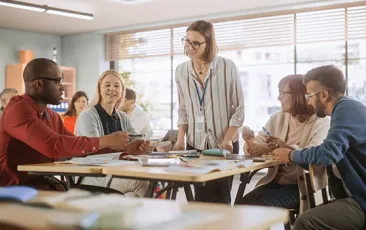 Teachers planning together in classroom
